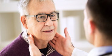 Doctor,Examining,Old,Patient,Lymph,Glands,,Throat,Inflammation