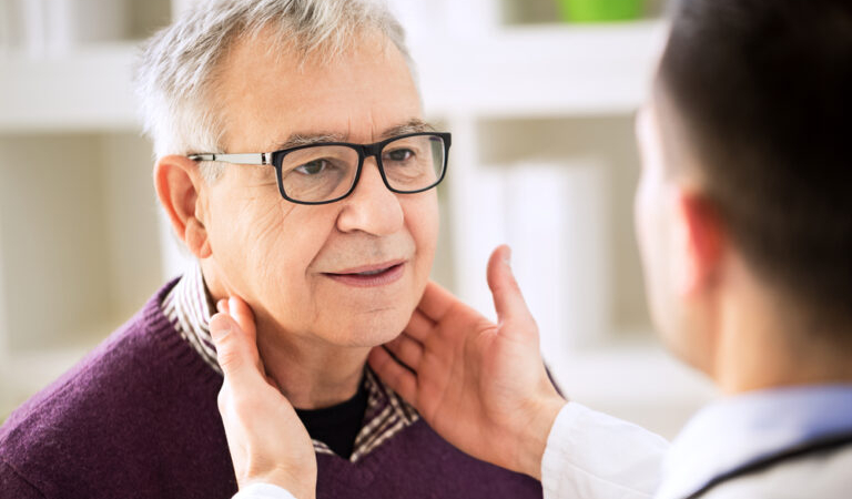 Doctor,Examining,Old,Patient,Lymph,Glands,,Throat,Inflammation