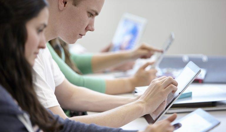 teenagers-using-digital-tablets-classroom-2022-03-07-23-55-55-utc-768x512